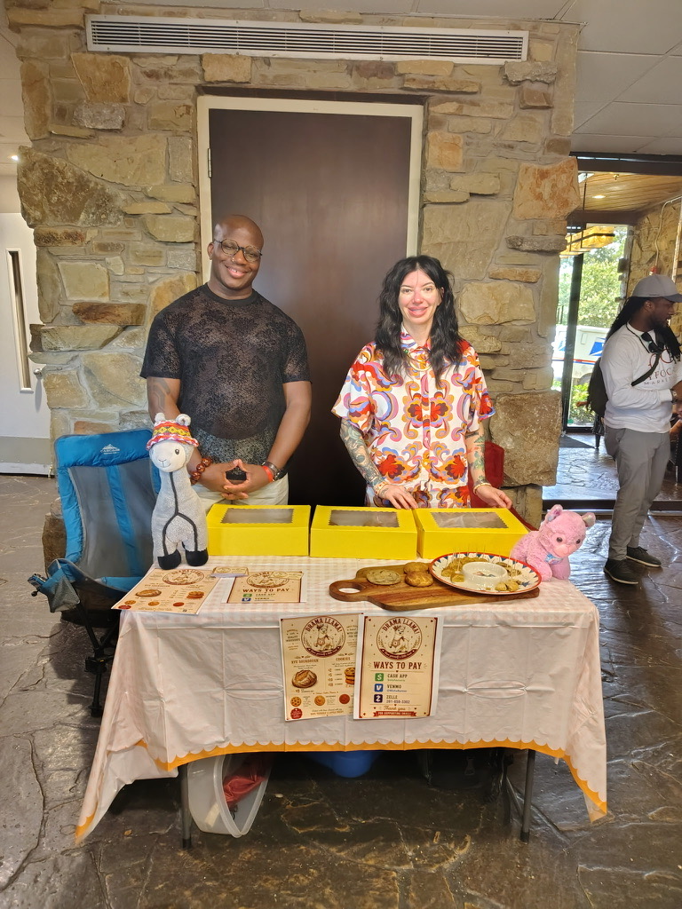 Drama Llama bakery table at a local community market